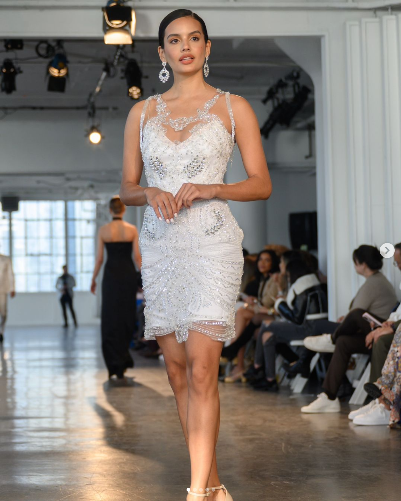 Elegant white sequin and beaded cocktail dress