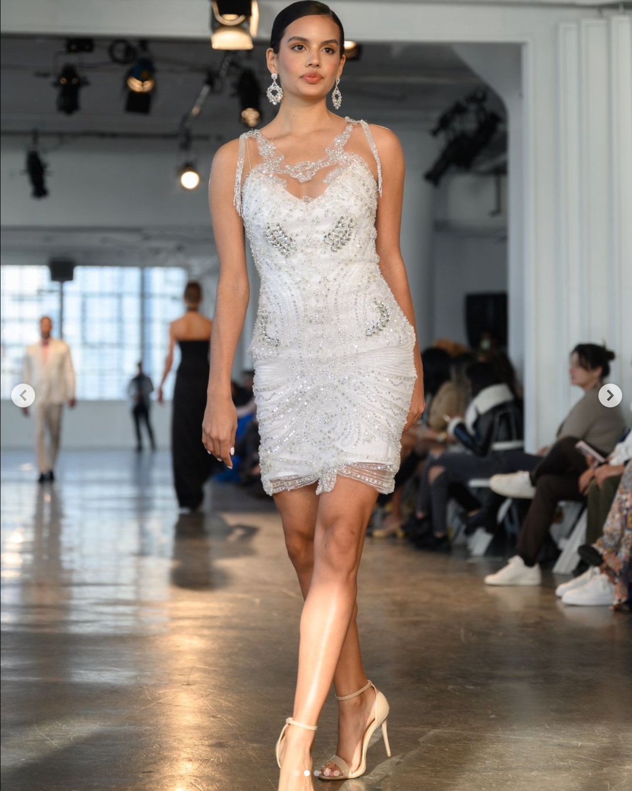 Elegant white sequin and beaded cocktail dress